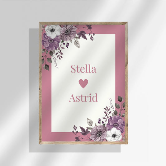 Syskonposter med rosa ram och vit mitt med hjärta. Personalisera med ett barnnamn ovanför och ett under hjärtat på den vita centrumytan. Tryckt på matt premiumpapper